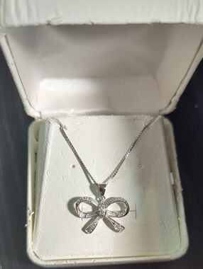 OTC Int'l for Kohl's Sterling Silver Diamond Bow Pendant on an 18-inch chain NWT